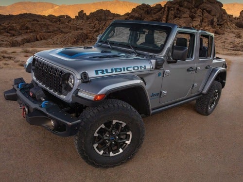 2024 Jeep Wrangler exterior view of vehicle parked with mountains in background