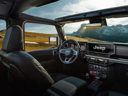 2024 Jeep Wrangler interior view of front seat and dash area